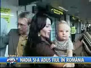 Nadia Comaneci taie motul de ziua copilului