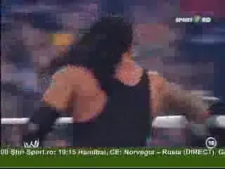 Imagini memorabile! Vezi aici finalul luptei dintre Undertaker si Batista de la Wrestlemania 23!