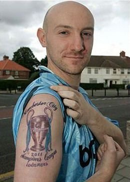 FOTO: El este cel mai PROST fan al lui Liverpool! Si-a schimbat numele in 