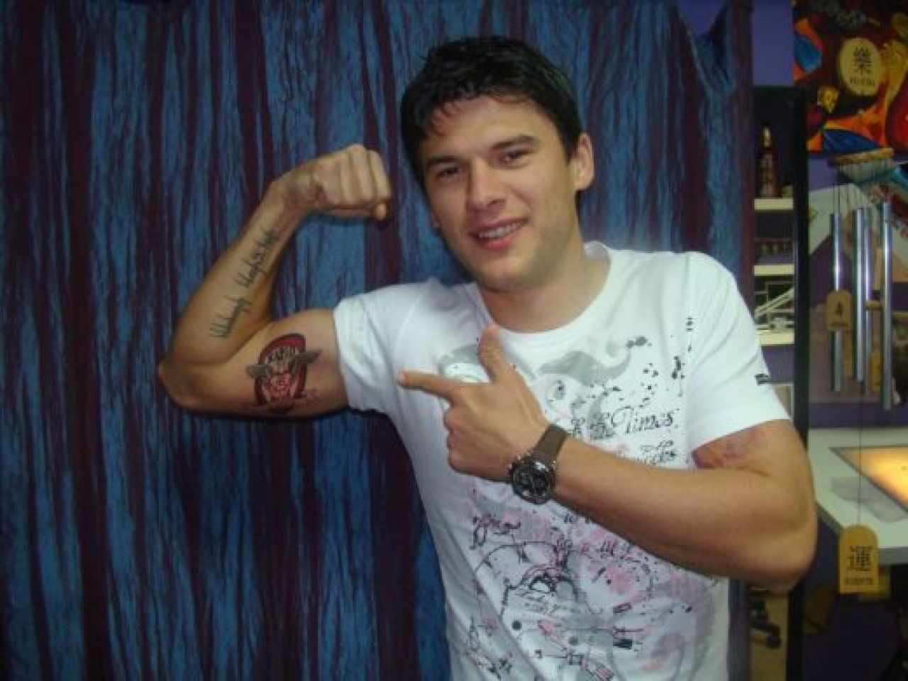 SUPER FOTO! Un jucator de la nationala si-a facut un TATUAJ GIGANT cu Rapid pe biceps! Vezi cine e:_5