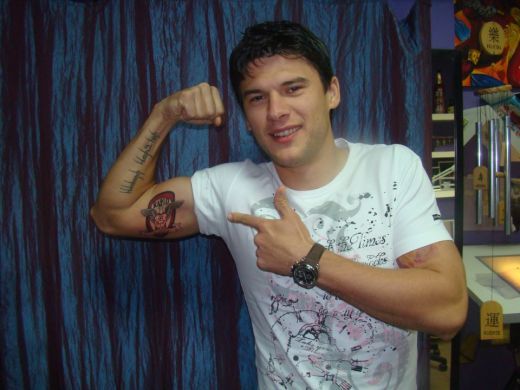 SUPER FOTO! Un jucator de la nationala si-a facut un TATUAJ GIGANT cu Rapid pe biceps! Vezi cine e:_5
