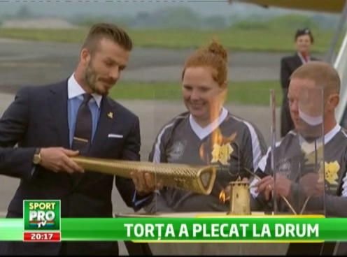 Beckham a adus flacara olimpica la Londra! 8.000 de oameni o vor purta pana la inceputul Jocurilor Olimpice