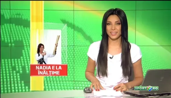 Nadia e INDRAGOSTITA de Romania! Azi a purtat torta olimpica la Londra! Ce mesaj le-a transmis milioanelor de fani