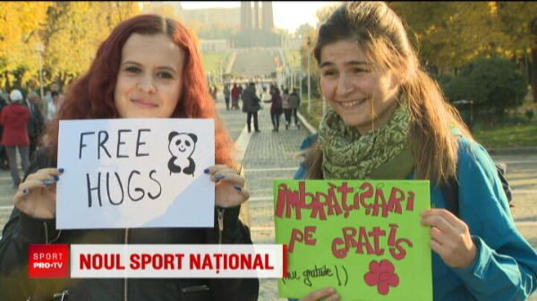 Imbratisarile, noul sport national! Avalansa de imbratisari pe strazile din Bucuresti! VIDEO