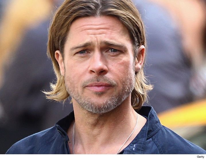 Gemenii care au platit cate 20.000 de dolari ca sa arate ca Brad Pitt: 