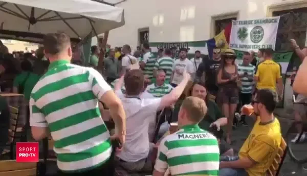 Fanii lui Celtic au pus stapanire pe centrul orasului! Atmosfera incendiara cu cateva ore inainte de meciul cu CFR. VIDEO