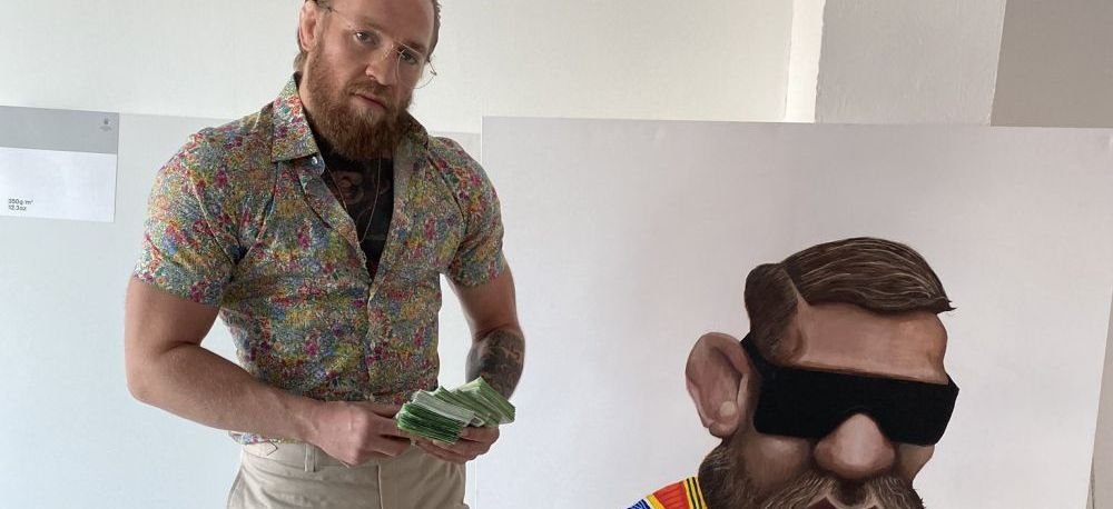 McGregor socheaza cu nou! Fotografiat cu un teanc de bani in plina criza! Cum a aparut in fata fanilor sai