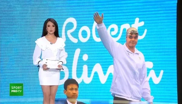 Gest de mare CAMPION al celui mai valoros inotator roman! Robert Glinta renunta la lucrurile lui de pret ca sa-l ajute pe un tanar care se lupta cu o boala grava