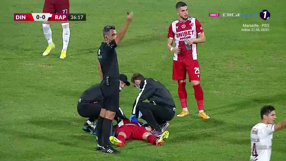 Momente de panică la Dinamo - Rapid! Răuță a căzut la pământ și a cerut rapid intervenția medicilor _5