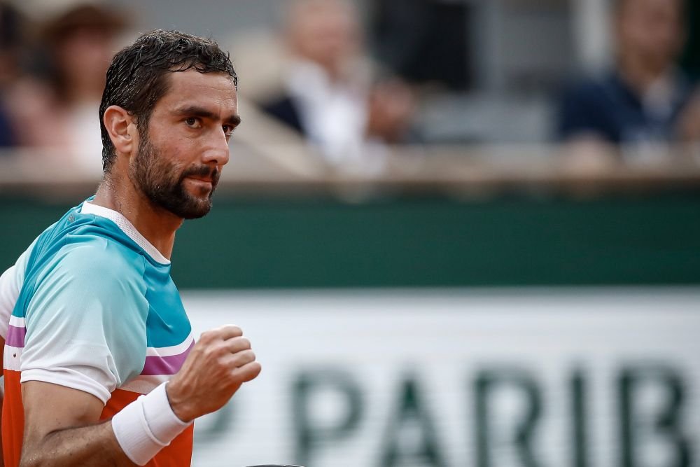 Incident nemaivăzut la Roland Garros: semifinala Cilic - Ruud, întreruptă de o protestatară care s-a legat de fileu_14