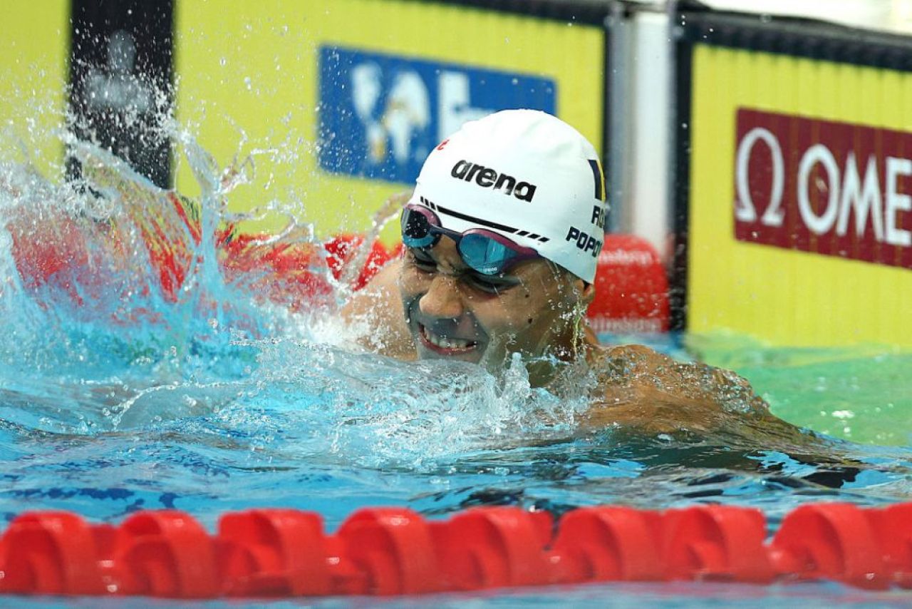 David Popovici, cursă fenomenală! A cucerit aurul la 200 m liber, la primul Mondial de seniori din carieră. Reacția sportivului în vârstă de 17 ani _12