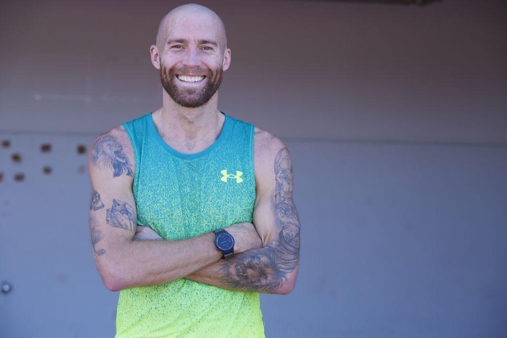 Stephen Scullion, maratonistul olimpic cu minte sclipitoare și pantofi verzi Under Armour Flow Velociti Elite.