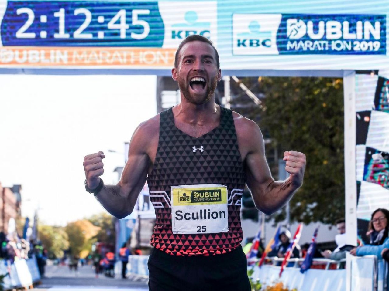 Stephen Scullion, maratonistul olimpic cu minte sclipitoare și pantofi verzi Under Armour Flow Velociti Elite.