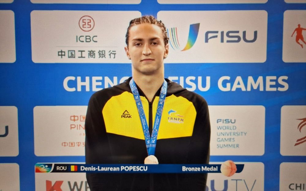 Rom&acirc;nia, insulă de prosperitate &icirc;n sportul lui David Popovici! Denis Popescu a luat medalie de bronz la Jocurile Mondiale Universitare