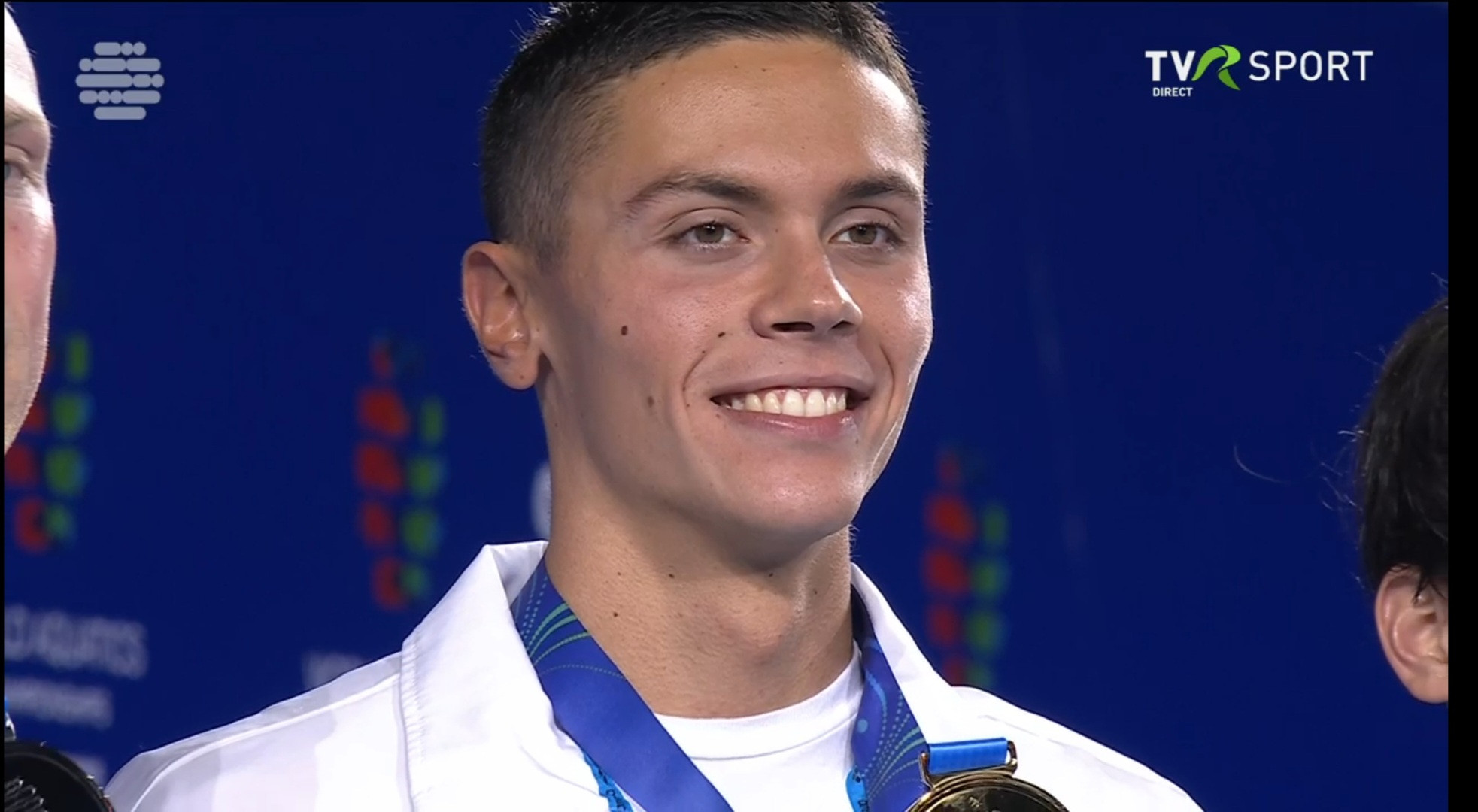 David Popovici, surpriză pe podiumul mondial: ce a primit, pe l&acirc;ngă medalie, și cine l-a premiat