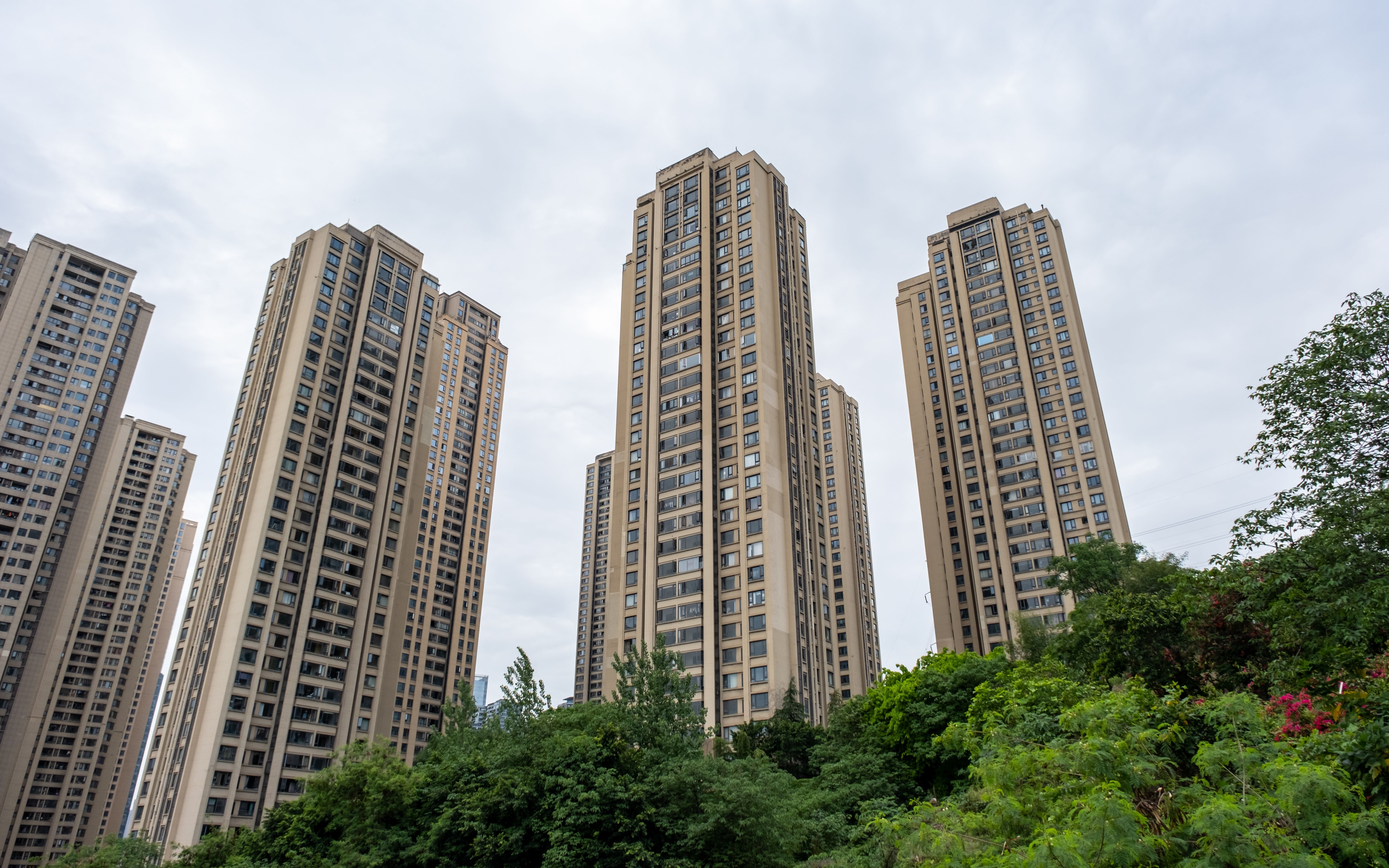 Un chinez a dat avansul pentru un apartament la etajul 34. După patru ani, a aflat că blocul avea doar 32 de etaje