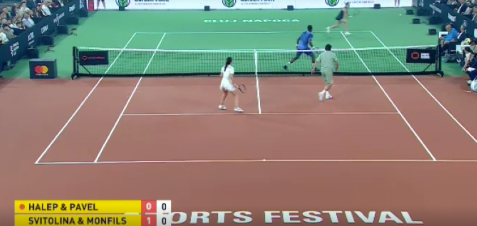 Simona Halep și Andrei Pavel au câștigat unul dintre cele mai tari puncte jucate în meciul de retragere al Simonei