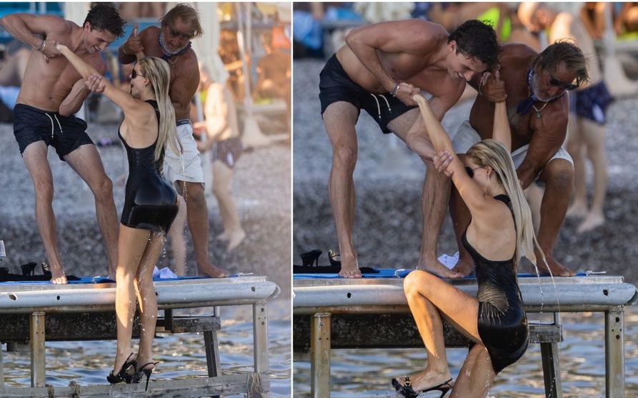 Spectacol total la plajă, chiar sub ochii paparazzilor! Vedeta a fost surprinsă făcând baie în rochie mini și tocuri